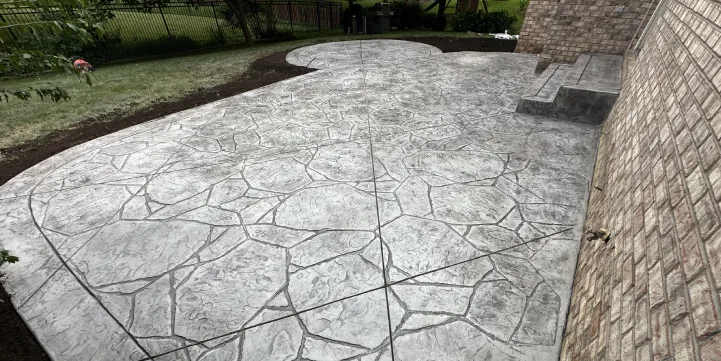 Stamped concrete patio offering good value for homeowners